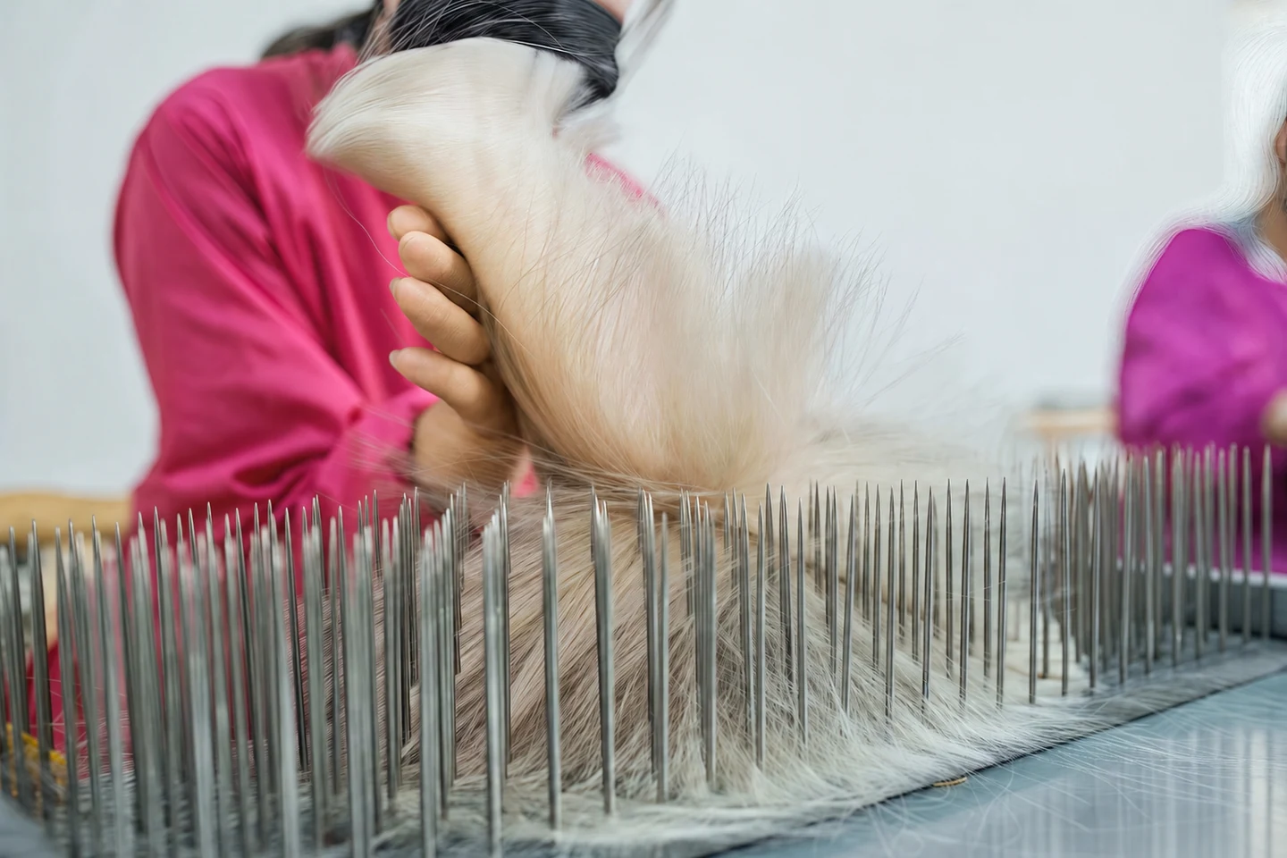 Epoche human hair hackling process for aligning and preparing strands