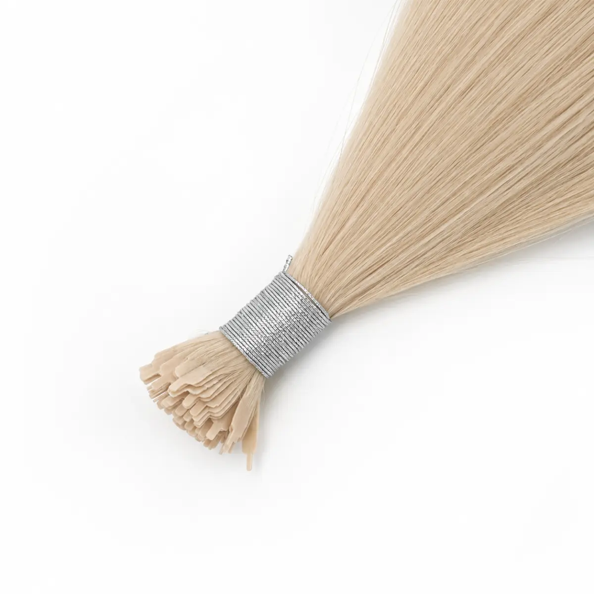 Light beige blonde Y-Tip Hair Extensions with shaped keratin tips and a silver tie on a white background.