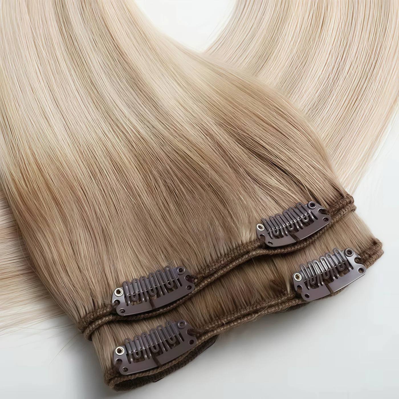 Classic clip-in hair extensions with folded weft pieces and sewn-on clips