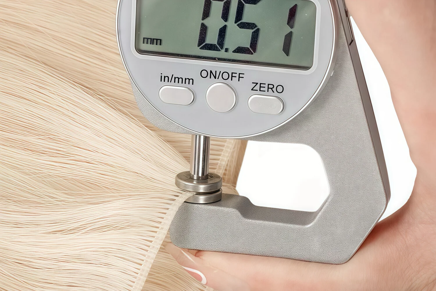 Measuring hair extension weft thickness during factory quality control