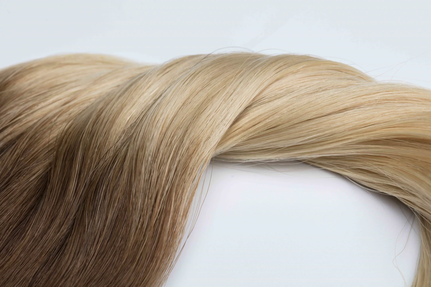 Blonde and brown hair extension color options for a private label product range