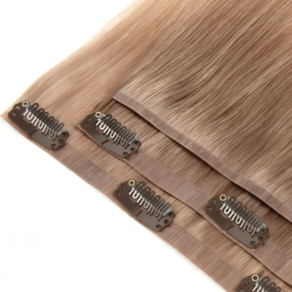 Close-up of the flexible polyurethane base and clips on PU clip-in hair extensions